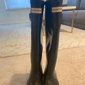 Black tall Hunter boots